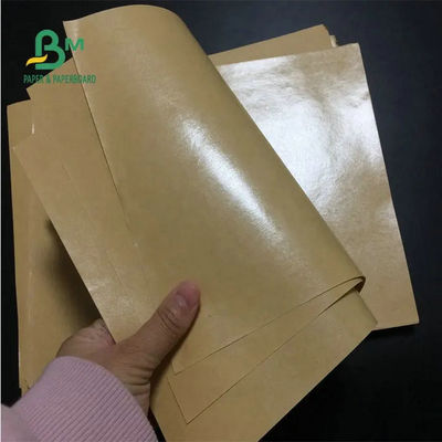 Oilproofブラウン クラフトはさみ金板、PEは食糧70gsm 80gsm 90gsmのための塗被紙ロールスロイスを包むこと