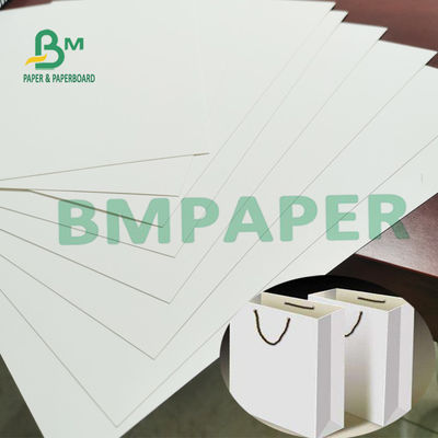 250gsm 70 * 100cm SBSの荷箱のための白いカード紙の折りたたみの紙箱用厚紙の理想